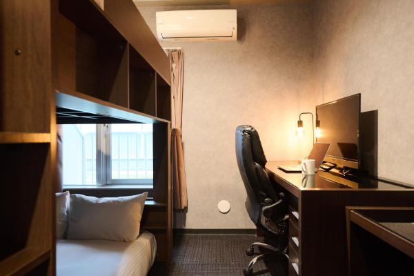 Na fotografii je vidět objekt Residence Hotel Stripe Sapporo nacházející se ve městě Sapporo.