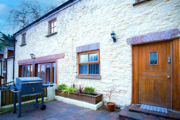 På billedet ses objektet Fletcher Coach House - 3 Bedroom Cottage - Pendine beliggende i byen Pendine.