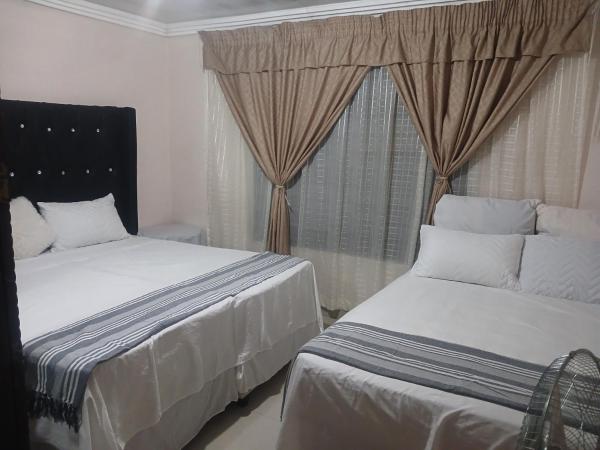 Na foto é possível ver o objeto Newview bnb and spa localizado na cidade de Thulamahashi.