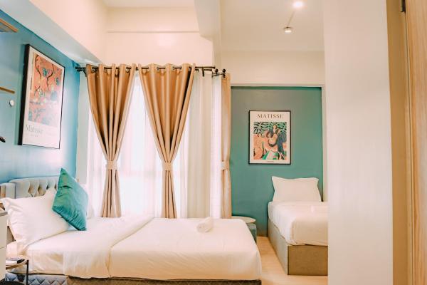 Na fotografii je vidět objekt I Suites Hotel Malate nacházející se ve městě Malate.