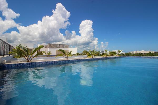 Auf dem Foto ist das Objekt Digital Nomad Condo with Rooftop, 2 Pools, Gym, Coworking and Cinema in der Stadt Tulum zu sehen.