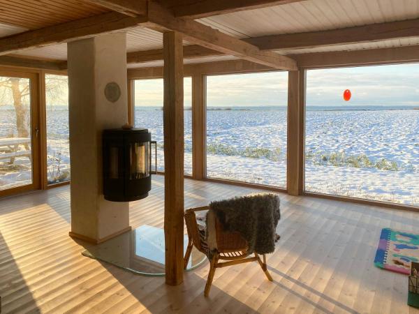 På billedet ses objektet Timber House With Sea View In Guldborg beliggende i byen Guldborg.