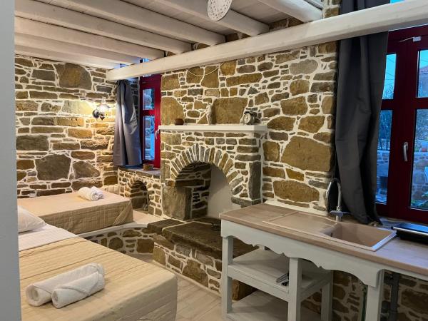 A la foto es mostra l'objecte Rodakas Rooms-Aimilia situat a la ciutat de Propoúlion.