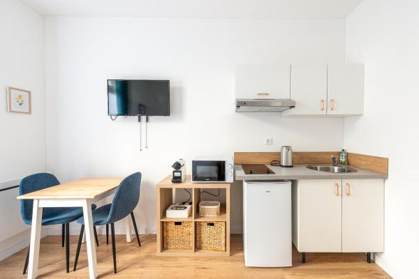 En la foto se muestra el objeto Studio lumineux et confortable Proche Douai Centre ubicado en la ciudad de Brébières.
