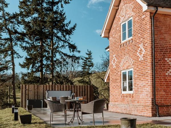 写真にはウェルシュプール市にあるCopper Beech Cottageが写っています。
