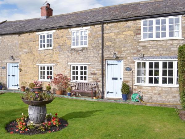 A la foto es mostra l'objecte Lilac Cottage situat a la ciutat de Appleton le Moors.