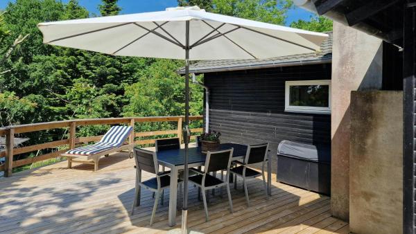 Στη φωτογραφία φαίνεται το αντικείμενο Summer House In Skovgårde With Forest View που βρίσκεται στην πόλη Allingåbro.