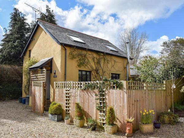A la foto es mostra l'objecte Barn Court Cottage situat a la ciutat de Templeton.