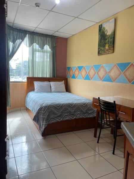 Na foto é possível ver o objeto Hostal Abu Dhabi localizado na cidade de Cuenca.