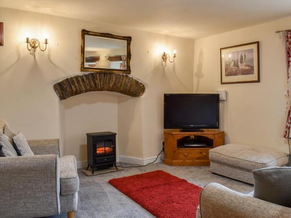 A la foto es mostra l'objecte Beck Foot Cottage situat a la ciutat de Grayrigg Station.