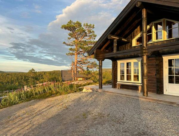 Στη φωτογραφία φαίνεται το αντικείμενο Family Cabin With Norefjell Mountain Views που βρίσκεται στην πόλη Lampeland.