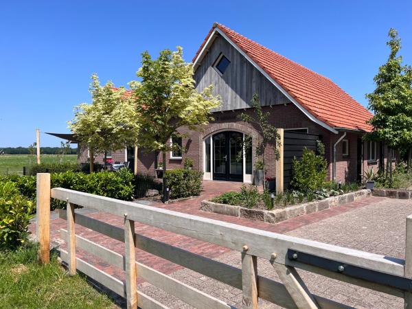 På billedet ses objektet Vakantiewoning 't Veldzicht beliggende i byen Tilligte.