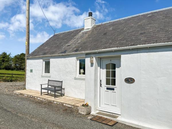 A la foto es mostra l'objecte Rose Cottage situat a la ciutat de Ardwell.
