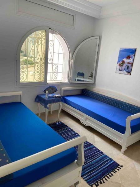 På bildet vises objektet Modern 3-Bedroom Apartment in Gated Residence with Pool som ligger i byen Yasmine.