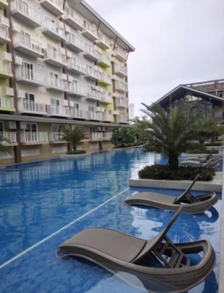 A la foto es mostra l'objecte Luxury Budget one Bedroom with living room and Kitchen Rest and fly at Amani Grand Resort situat a la ciutat de Pusok.