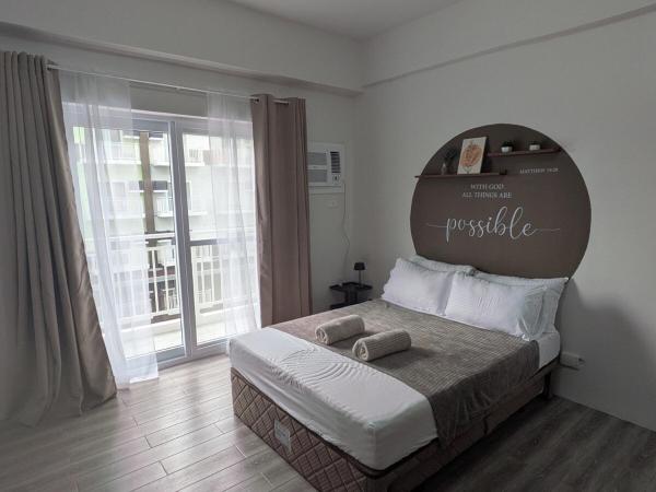 A la foto es mostra l'objecte Cebu Airport budget Luxury living Rest& Fly at Amani Grand Resort situat a la ciutat de Pusok.