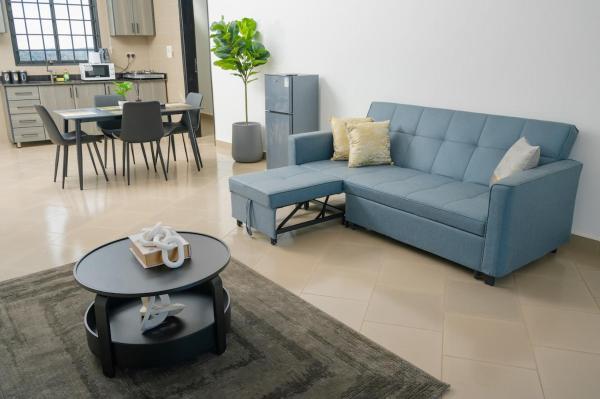 La photo montre l'objet Cozy 2BR Apt With free WiFi & Parking Bweya Kajjansi situé dans la ville de Kitende.
