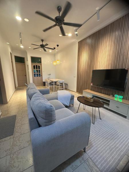 A la foto es mostra l'objecte Cozy Muji Concept Home situat a la ciutat de Labuan.
