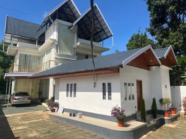 Nella foto è visibile l'oggetto GMG Gardens Homestay Munnar situato nella città di Munnar.
