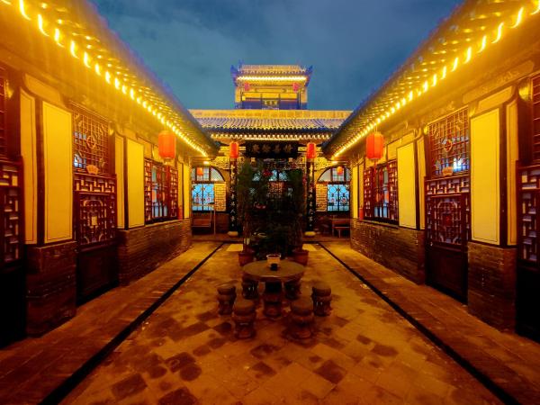 На фото показан объект Pingyao Xiangshengyuan Guest House, расположенный в городе Пинъяо.