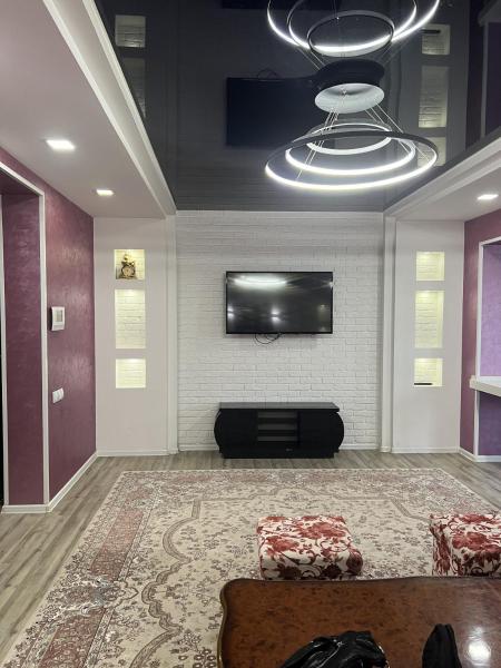 A la foto es mostra l'objecte Helton Style Apartment situat a la ciutat de Fergana.