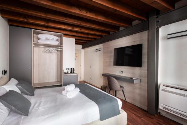 A la foto es mostra l'objecte GuestHost - Santo 86 Luxury Rooms situat a la ciutat de Pàdua.