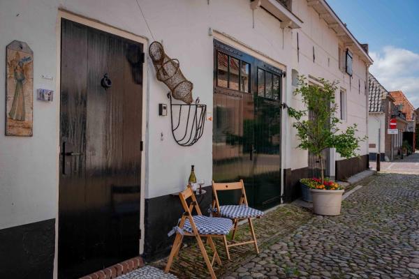 Na foto é possível ver o objeto Elburg-Vesting sfeervol appartement Bij de jufferen localizado na cidade de Aperloo.