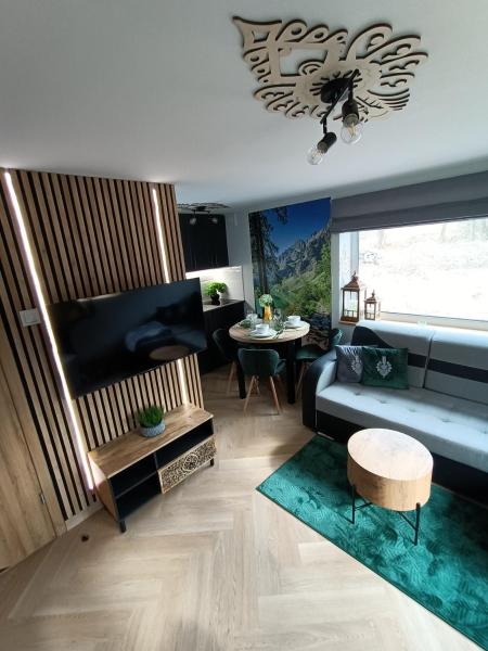 Na fotografii je vidět objekt Apartament Zacisze w Białym Dunajcu, Sauna, Kominek, Bezpłatny parking nacházející se ve městě Biały Dunajec.