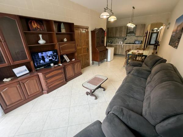 The photo shows the Traditional Maltese 3BD Apartment with Front & Back Balconies - Close to Gozo Ferry located in the city of Fontana.