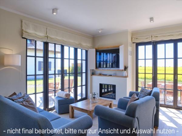 A la foto es mostra l'objecte Reetland am Meer - LuxusPlus Reetdachvilla mit 4 Schlafzimmern und Kamin G10 situat a la ciutat de Dranske.