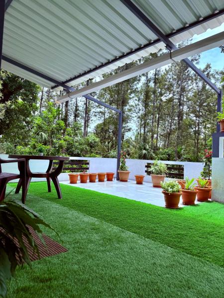 A la foto es mostra l'objecte Anya Retreats Nature Homestay situat a la ciutat de Kushālnagar.