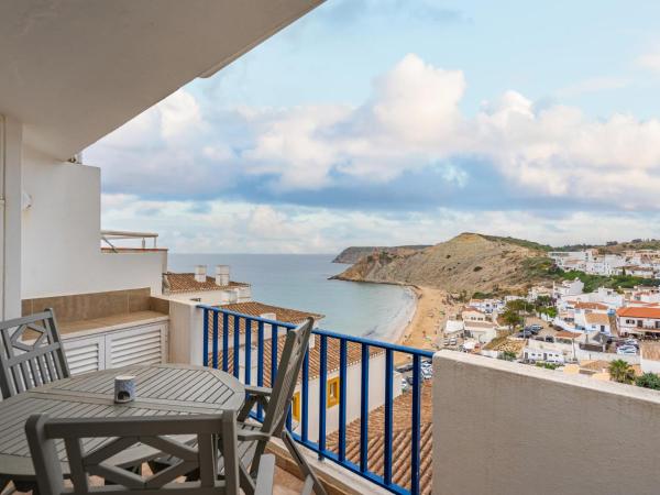 The photo shows the Retreat with sea view #1972 located in the city of Budens.