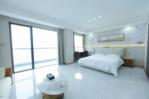 På billedet ses objektet Xigang Xingsha Bay International Hotel beliggende i byen Sisophon .