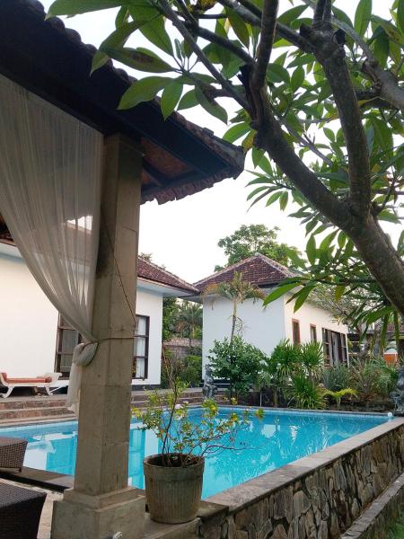 A la foto es mostra l'objecte Lovina villa cinta situat a la ciutat de Lovina.