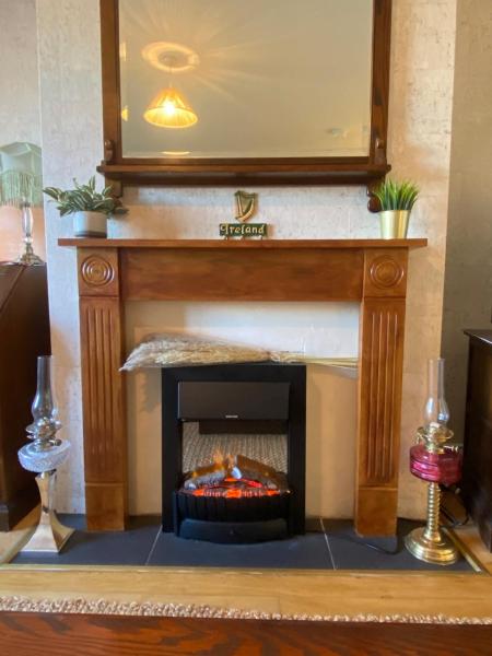 A la foto es mostra l'objecte Cosy Authentic Home situat a la ciutat de Dunmurry.