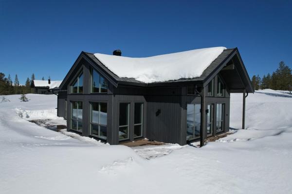 A la foto es mostra l'objecte New Mountain Cabin in Trysil Knuts Fjellworld situat a la ciutat de Jordet.