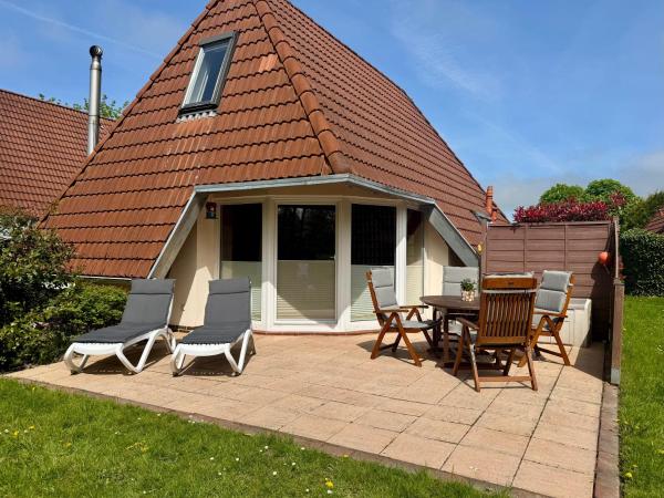 A la foto es mostra l'objecte Ferienhaus Mit Terrasse, Grill Und Garten situat a la ciutat de Dorum Neufeld.