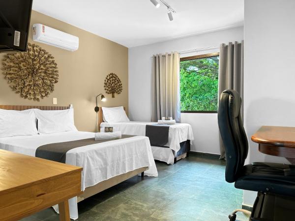På billedet ses objektet 200m da praia AC 1 Suite Churrasqueira Jacuzzi beliggende i byen Guarujá.
