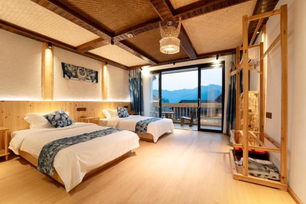 A la foto es mostra l'objecte Xijiang Longtang Liyuan Mountain Resort B&B situat a la ciutat de Leishan.