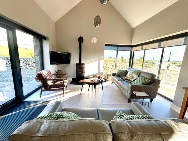A la foto es mostra l'objecte Maggie's Cottage situat a la ciutat de Moyad.