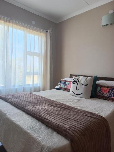 На фото показан объект Sweets Flats, расположенный в городе Габороне.