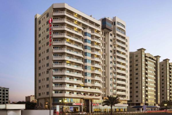 The photo shows the Ramada by Wyndham Beach Hotel Ajman located in the city of Ajman .