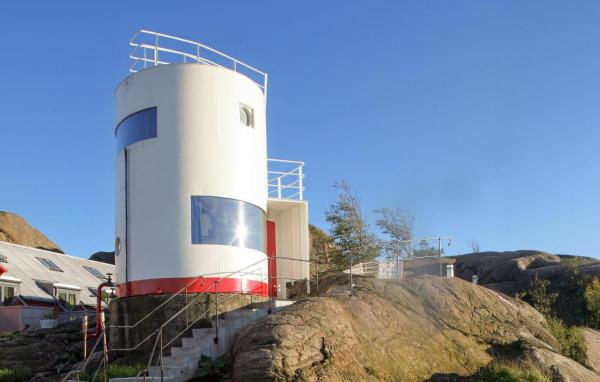 The photo shows the Nice Home In Søgne With Wifi located in the city of Søgne.