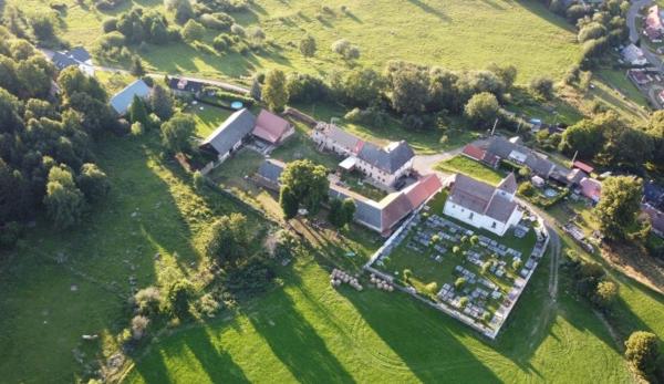 Na fotografii je vidět objekt Zemědělská Usedlost Albrechtice nacházející se ve městě Podmokly.
