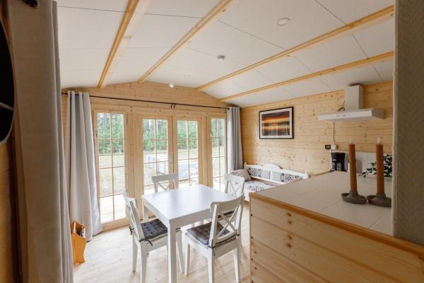 На фото показан объект Gustava Parken - 4 persons cottage, расположенный в городе Gustavsfors.