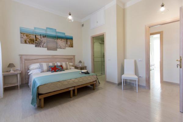 A la foto es mostra l'objecte Brezza Marina Luxury Rooms situat a la ciutat de Cagliari.