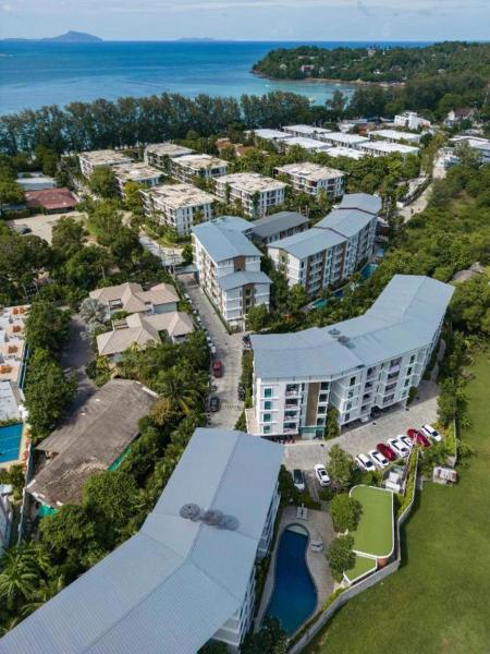 A la foto es mostra l'objecte C130 Steps to Beach 1BR Condo Gym, Pool & Sauna situat a la ciutat de Rawai Beach.