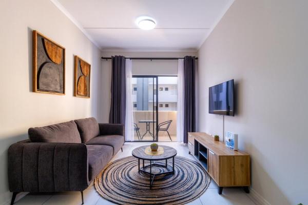 A la foto es mostra l'objecte First Floor 2 Beds Premium Suite situat a la ciutat de Midrand.