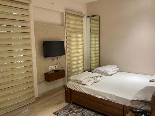 A la foto es mostra l'objecte Bluebonnets Hotel situat a la ciutat de Indore.