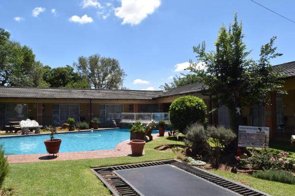 A la foto es mostra l'objecte African Elephant Guesthouse situat a la ciutat de Germiston.